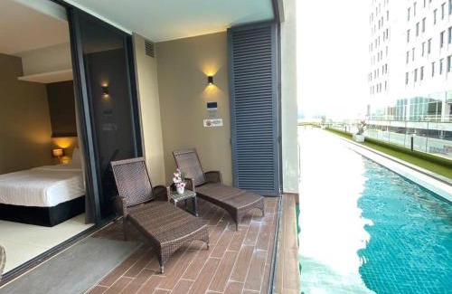 Tanjong Bidara Apartment | Poolside Suite - Amanjiwa 99 Residences