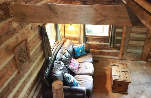 Brenham Cabin | Private Log Cabin for a Unique Getaway at Scenic Hill Retreat