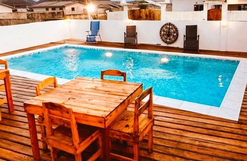 Assouinde Apartment | Room in residence - Swimming pool - Restaurant - Beach access