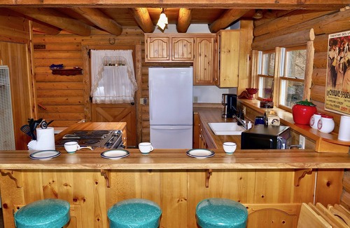 Pine Cove Cabin | Scenic Hillside Retreat: Vintage Log Cabin & Forest Retreat