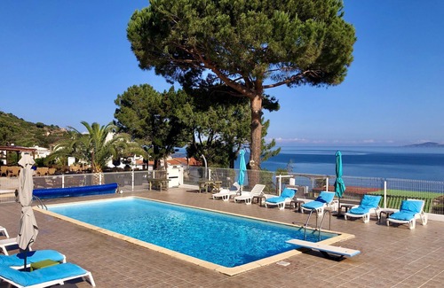Calcatoggio Apartment | Seaside holiday flat for 2 with terrace, pool, and restaurant
