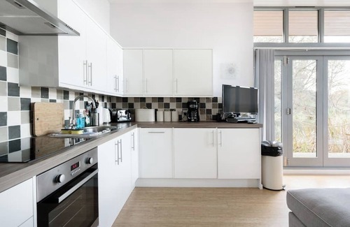 New Forest District Ski Chalet | Secluded, New Forest Riverside Lodge