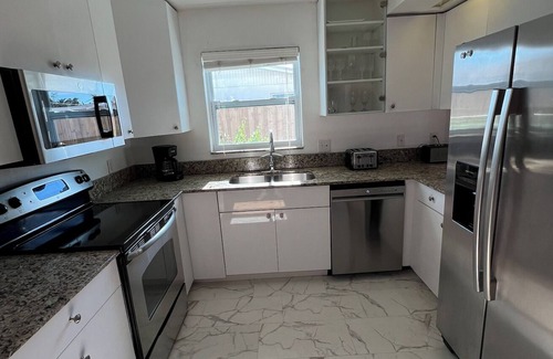 Naples Park Apartment | Spacious apartment on two floors with beautiful sunset views.