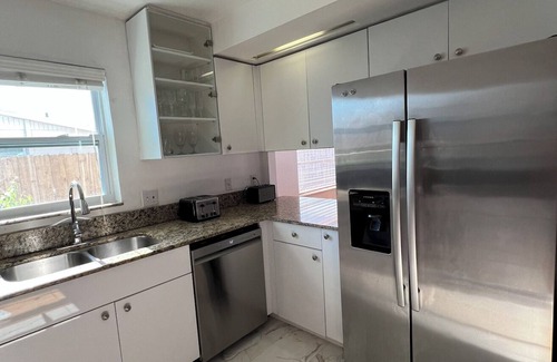 Naples Park Apartment | Spacious apartment on two floors with beautiful sunset views.