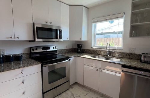 Naples Park Apartment | Spacious apartment on two floors with beautiful sunset views.