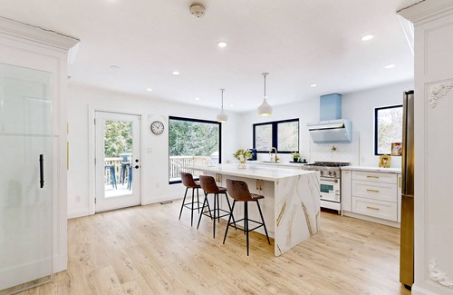 Springwater House | Spacious home with a private pool, hot tub, multiple decks, washer/dryer, & AC