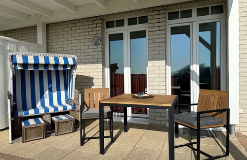 Wremen Apartment | Strandnahe, Hundefreundliche Ferienwohnung mit Sauna, Terrasse und Strandkorb