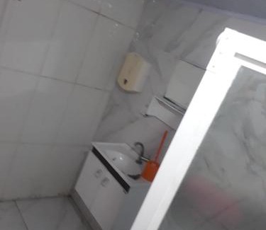 Praia Grande Apartment | Suíte frente mar