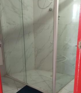 Praia Grande Apartment | Suíte frente mar