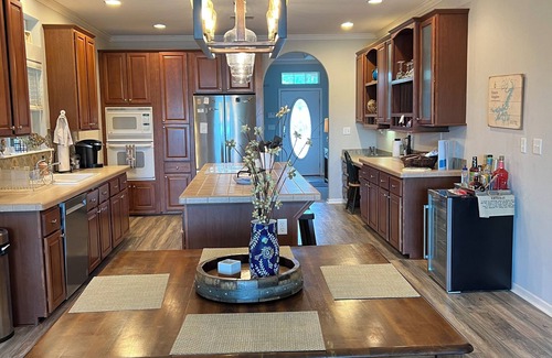 Graham House | Tranquil Waterfront property with a pool, hot tub, fire-pit & large patio.