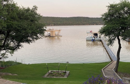 Graham House | Tranquil Waterfront property with a pool, hot tub, fire-pit & large patio.