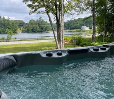 Dryden House | Tranquil Waters - Modern Lakefront Haven with Hot Tub - Explore, Relax, and Recharge! Close to UMF!