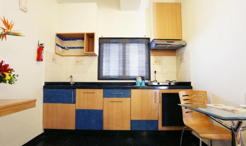 Ejipura Hotel | Treebo Edha Suites Koramangala