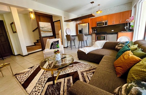 Turibana House | Tropical Bohemian style townhouse 5 mins to Palm Beach, Restaurants & Nightlife.