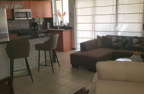 Turibana House | Tropical Bohemian style townhouse 5 mins to Palm Beach, Restaurants & Nightlife.