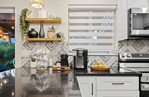 Edgewood House | Tropical Getaway + Heated Pool, Arcades–5 MIN to The Fort: Pickleball - Sleeps 8