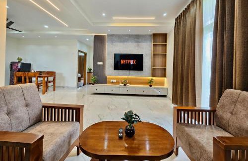 Tirupati Apartment | TrueLife Summit Suites - Premium stay near Tirupati temples - Breakfast included - 2BHK Studio AC apartments - 55" Android TV, 250 Airtel channels, Super fast WiFi - Generator, Hall, Modular kitchen, RO system, Microwave - Top service with lots of Love