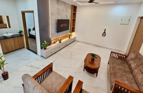 Tirupati Apartment | TrueLife Summit Suites - Premium stay near Tirupati temples - Breakfast included - 2BHK Studio AC apartments - 55" Android TV, 250 Airtel channels, Super fast WiFi - Generator, Hall, Modular kitchen, RO system, Microwave - Top service with lots of Love