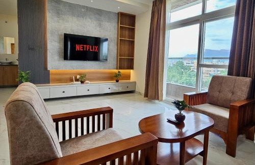 Tirupati Apartment | TrueLife Summit Suites - Premium stay near Tirupati temples - Breakfast included - 2BHK Studio AC apartments - 55" Android TV, 250 Airtel channels, Super fast WiFi - Generator, Hall, Modular kitchen, RO system, Microwave - Top service with lots of Love