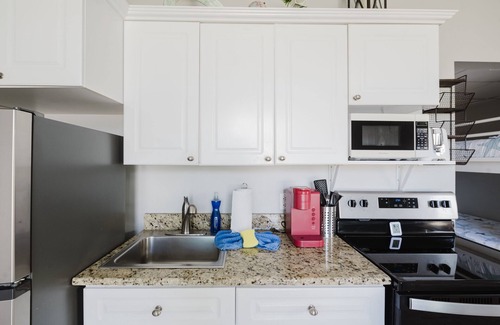 Crystal Shores House | Turtle Beach Bottom Unit 9B - Walk to the beach!