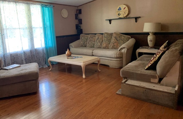 5 bdrm, 3 full bth, large living room and fireplace area.