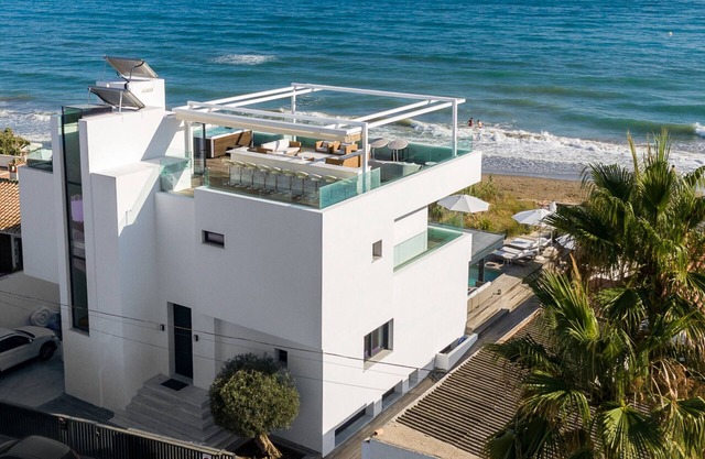 Beachfront Villa with Heated Pool & Spa