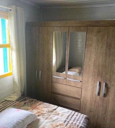 Casa com piscina e salão de jogos para aluguel de temporada e finais de semana em Torres/RS.