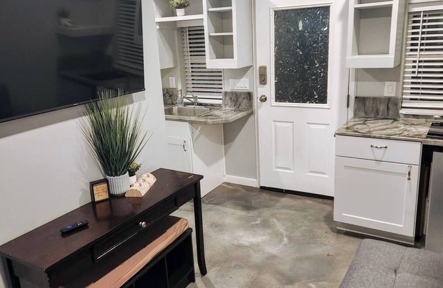 Cozy country cottage with access to hot tub, cold plunge pond, & so much more.