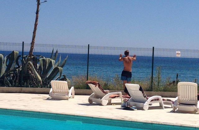 Feet in the water, sea and pool