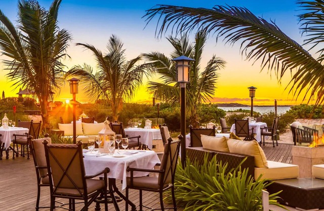 Indulge in Oceanfront Luxury with Pool, Gourmet Dining, and Beach Access