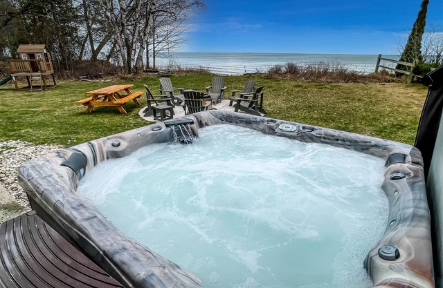 Lakefront Cabin | HotTub, Secluded, Kayaks/Bikes