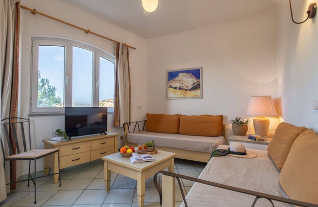 Lovely apartment for 4 guests with A/C, pool, WIFI, TV, terrace and pets allowed