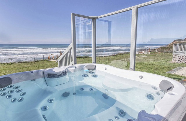 Ocean Front Home! Sleeps 12! Five Bedrooms + Guest Cottage! Hot Tub!