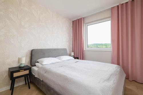 Pastel Apartment with Balcony and Parking by Noclegi Renters