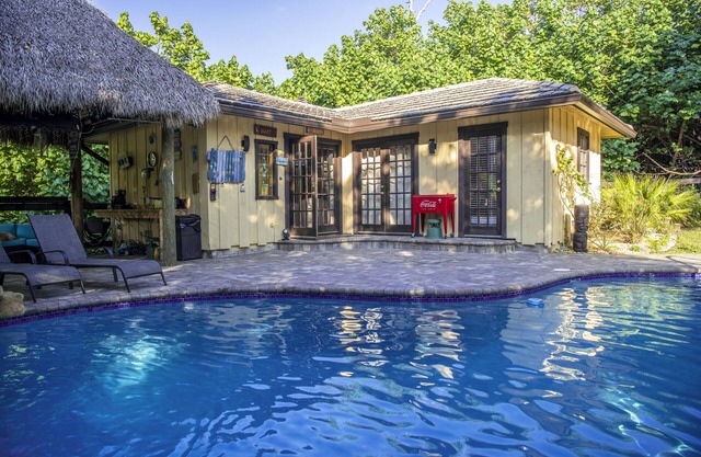 Quaint Pool House in Tropical Setting
