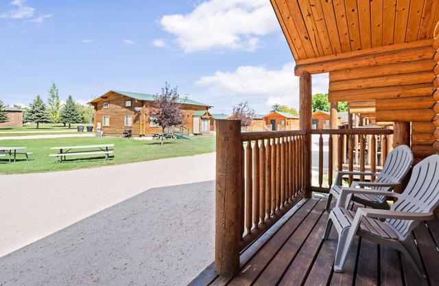 Rustic camping studio with large front porch & kitchenette