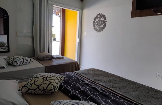 Suite with simple decor, balcony, hammock, air conditioning, minibar and smart TV