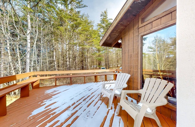 Two-story home with a fireplace & deck - across the street from lake access