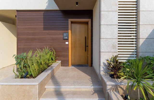 villa with private garden in the crown palm hills compound -sheikh zayed
