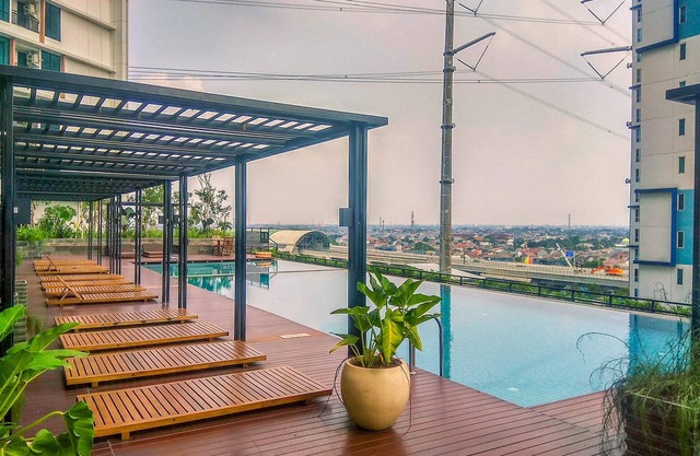 Wooden Touch Studio At Lrt City Bekasi Apartment