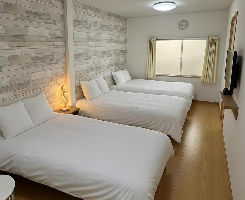 Minato Apartment | 万博直通 観光拠点に最適な高コスパ&快適宿