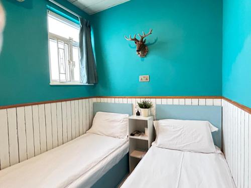 Mong Kok House | 香港名都商务旅馆 Ming Du Guesthouse