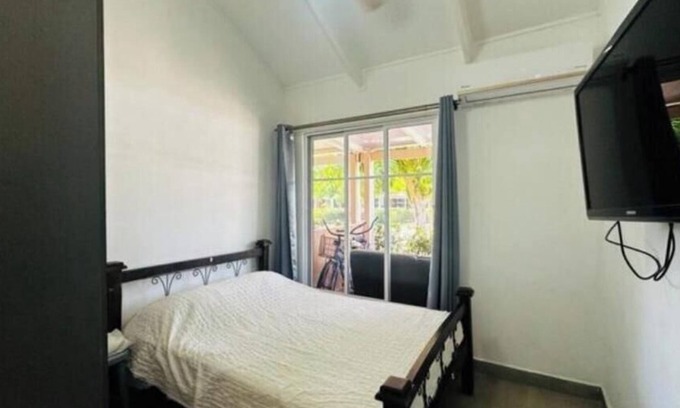 Barrio Santa Lucia Villa | 2-bedroom villa in charming Jacó with AC WiFi. 1 block from ocean. Relax, enjoy