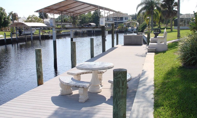 Gulf Cove House | A Piece of Heaven, Waterfront Home, Heated Screened Pool & in Port Charlotte