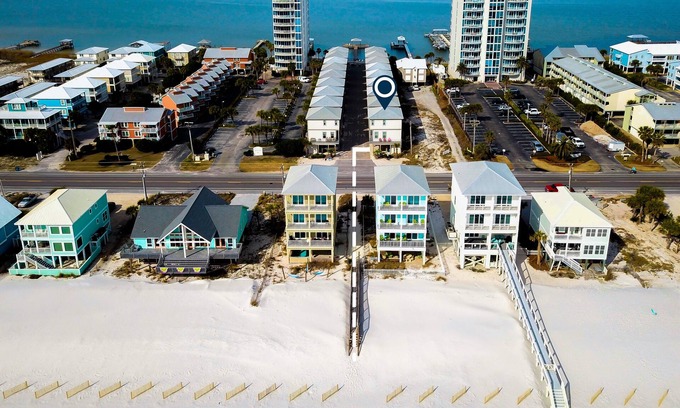 Gulf Shores Cottage | Beach-view cottage near beach with pool, wrap-around balcony, boat dock, W/D, AC