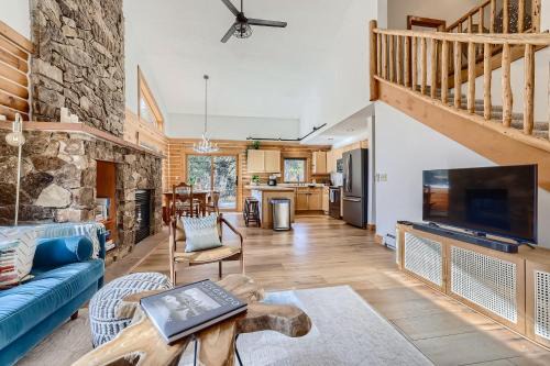 Blue River House | Cabin on The Blue an On the River Private Home with a Hot Tub and Views
