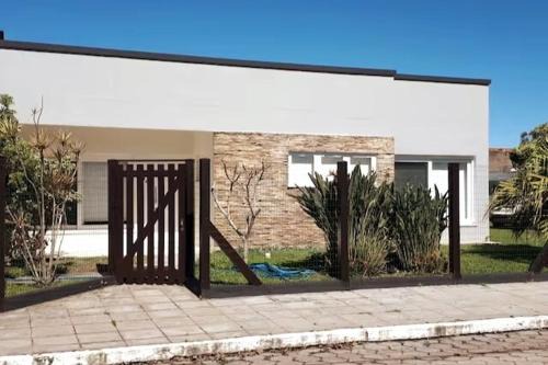 Xangri-La House | Casa com 4 dormitórios e piscina em Xangri-lá