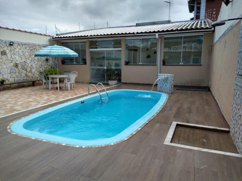 Ipiranga House | Casa de praia com piscina em Caraguatatuba - SP