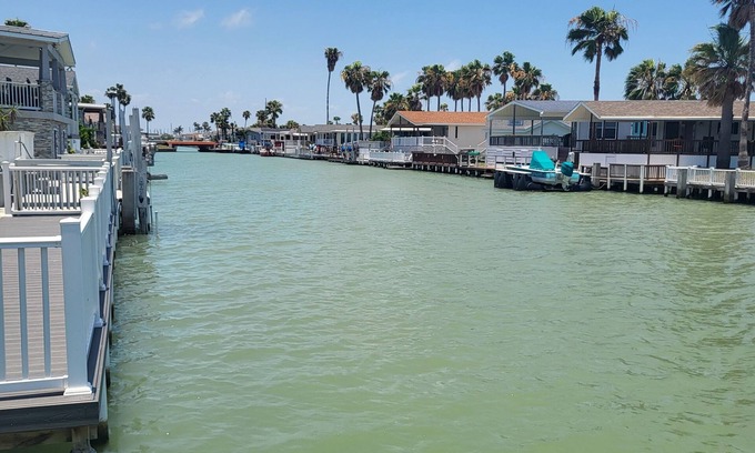 Port Isabel Cottage | Charming 1-bedroom waterfront beach cottage on the canal in LIV Port Isabel