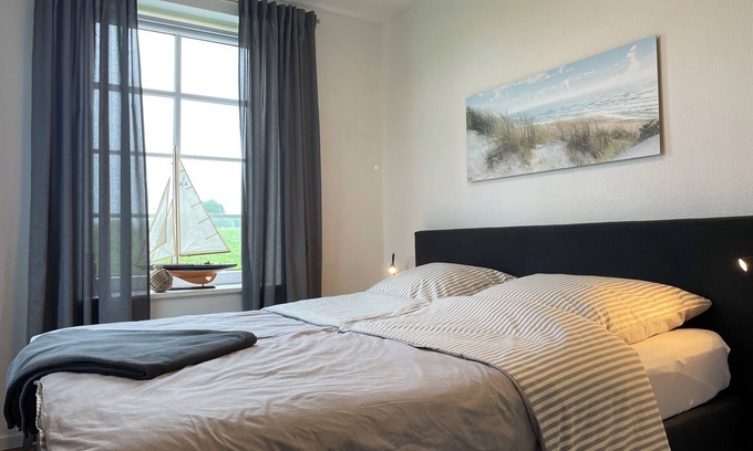 Krautsand Apartment | Deichperle KrautsandDirectly on the dike Distance to the beach only 50 mtr